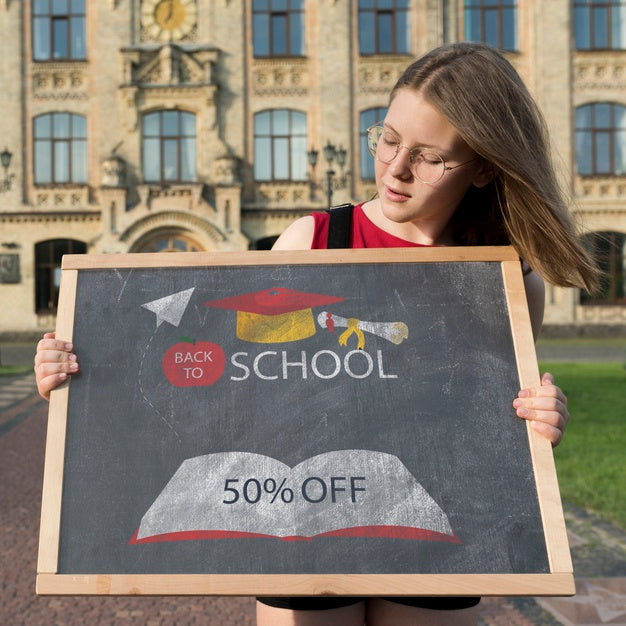 Free Girl With Glasses Holding A Blackboard Mock-Up Psd