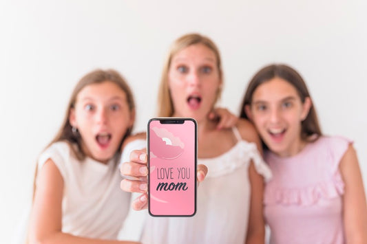Free Girls Presenting Smartphone Mockup For Mothers Day Psd