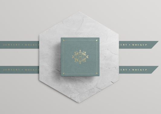 Free Green Jewelry Box On Marble With Golden Symbol Psd