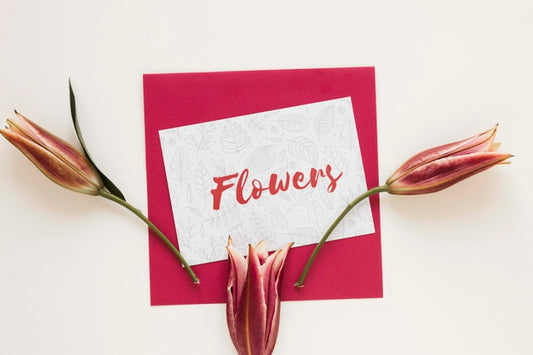 Free Greeting Card With Blooming Flowers On Table Psd