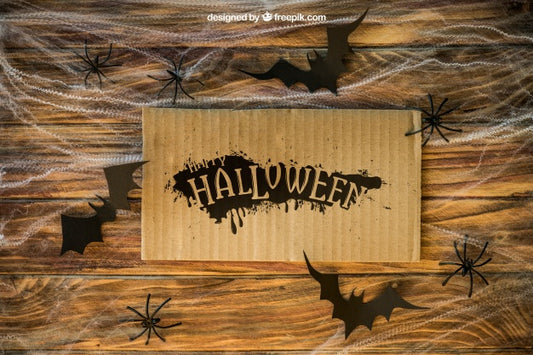 Free Halloween Mockup With Cardboard On Cobweb Psd