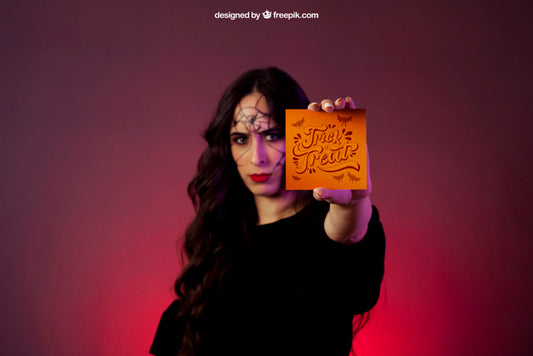 Free Halloween Mockup With Girl Holding A Card Psd
