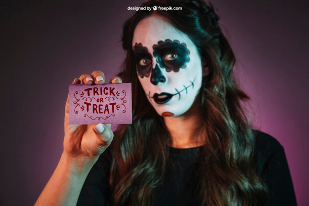 Free Halloween Mockup With Girl Holding Business Card Psd