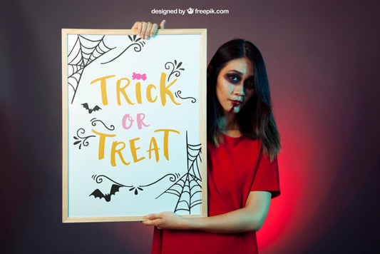 Free Halloween Mockup With Girl Holding Whiteboard Psd