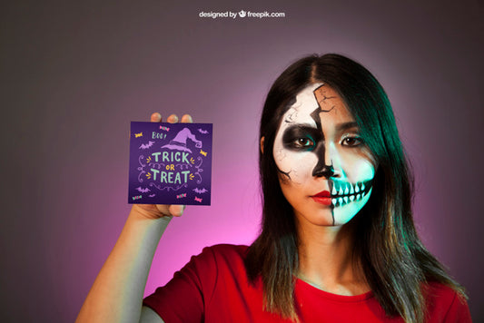 Free Halloween Mockup With Girl Presenting Card Psd