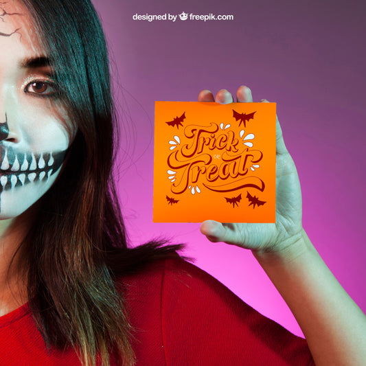 Free Halloween Mockup With With Girl Holding Card In Hand Psd