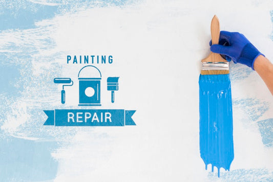 Free Hand Holding Brush With Blue Paint Mock-Up Psd
