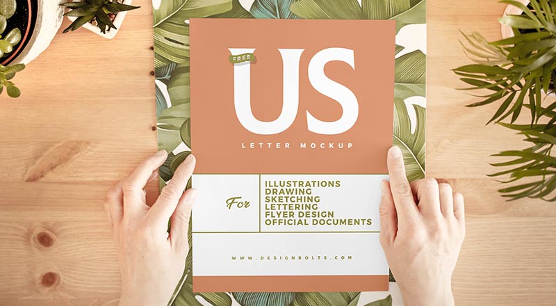Free Hand Holding White Us Letter Paper Mockup Psd