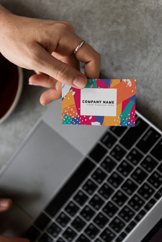 Free Handing Out A Business Card Mockup Psd