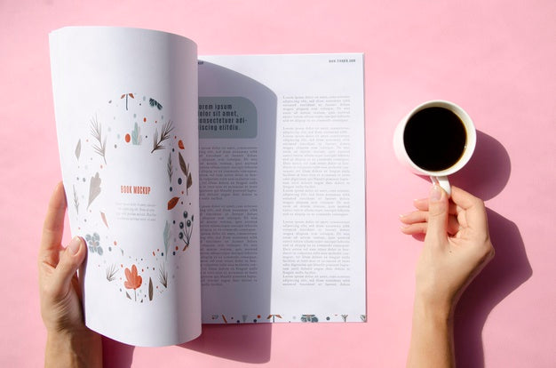Free Hands Holding A Magazine And A Cup Of Coffee Mock Up Psd