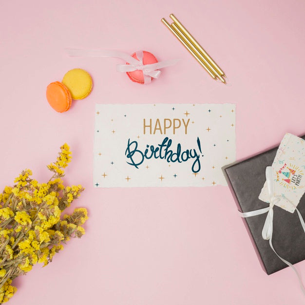 Free Happy Birthday Mock-Up With Invitation Card And Flowers Psd