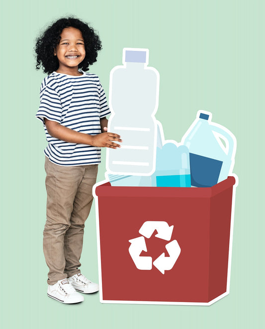 Free Happy Boy Collecting Plastic Bottles In A Recycling Box