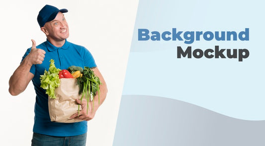 Free Happy Delivery Man Holding A Bag Of Groceries Psd