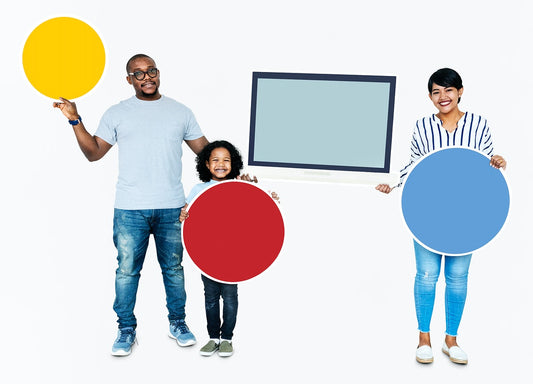 Free Happy Family Holding Round Boards And A Screen