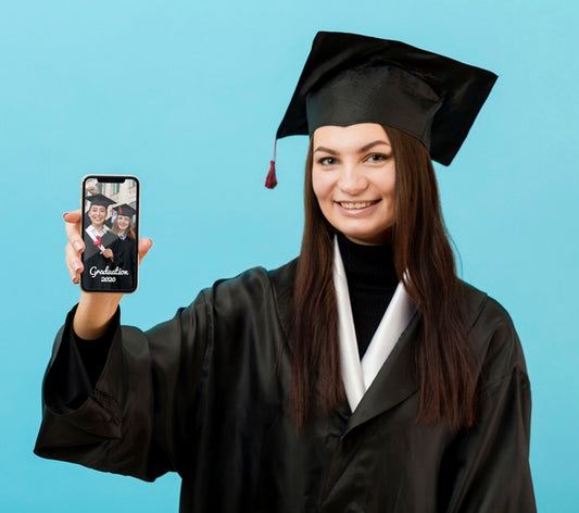 Free Happy Graduation Student Holding Mobile Phone Psd