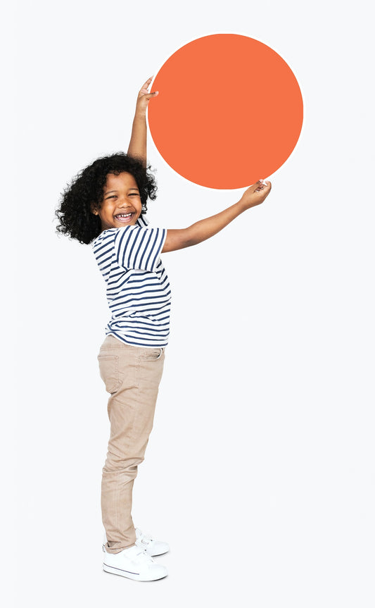 Free Happy Kid Holding An Orange Empty Board