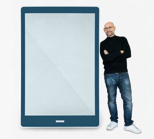 Free Happy Man Standing Beside A Tablet Psd