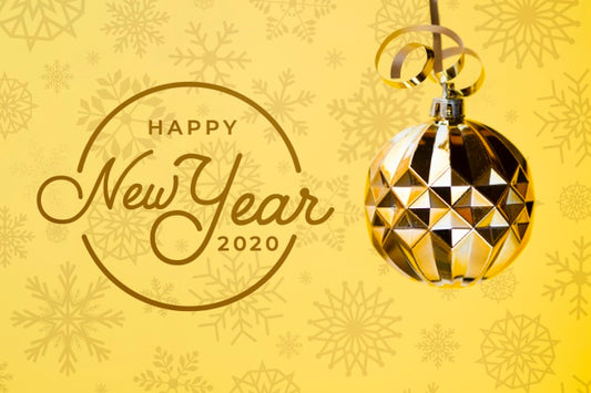 Free Happy New Year 2020 With Golden Christmas Ball On Yellow Background Psd
