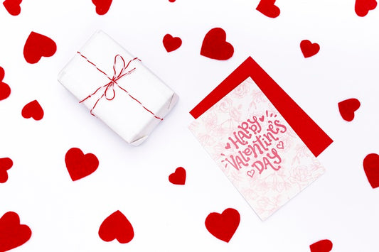 Free Happy Valentines Day Card Next To Wrapped Gift Psd