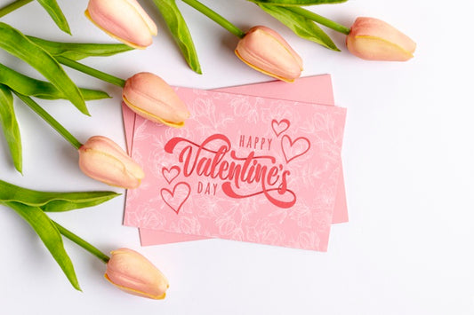 Free Happy Valentines Day Lettering On Pink Card Next To Tulips Psd