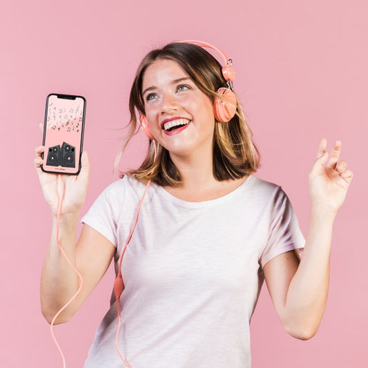 Free Happy Young Woman With Headphones And Cellphone Mock-Up Psd