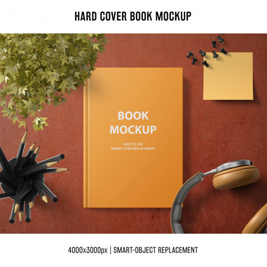 Free Hard Cover Book Mockup With Headphones Psd