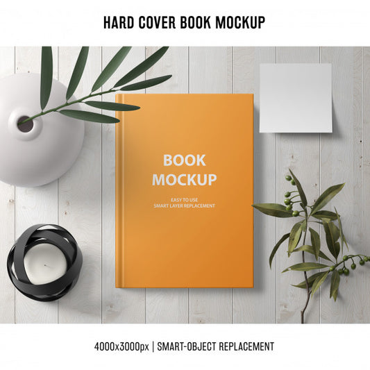 Free Hard Cover Book Mockup With Plants Psd