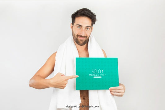 Free Healthy Man Posing With Towel Andtemplate Psd