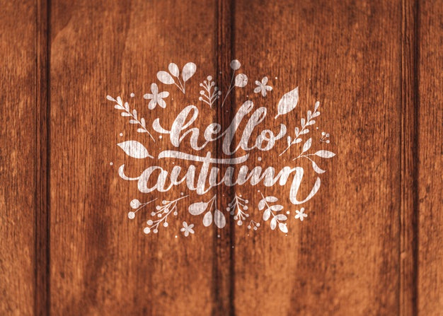 Free Hello Autumn Written On A Wooden Background Psd