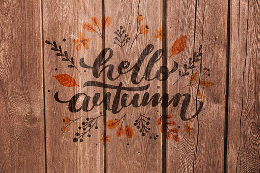 Free Hello Autumn Written On A Wooden Background Psd