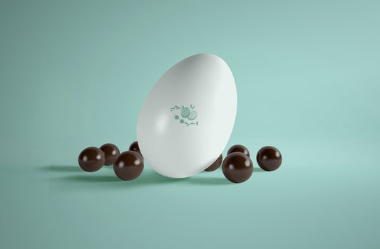Free High Angle Big Egg With Small Chocolate Eggs Beside Psd