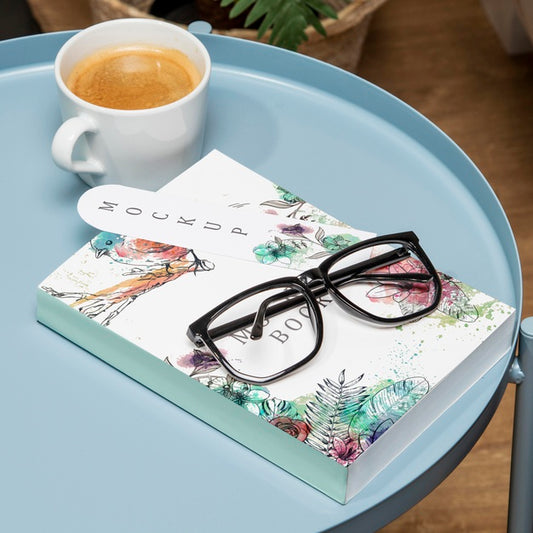 Free High Angle Book Mock-Up On Coffee Table With Glasses And Bookmark Psd
