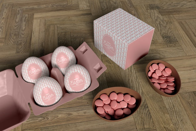 Free High Angle Chocolate Egg With Candies And Formwork With Eggs Psd