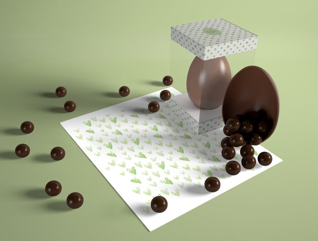 Free High Angle Easter Egg With Chocolate Candies Psd