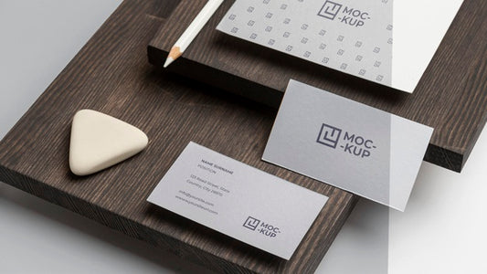 Free High Angle Mock-Up Stationery On Wood Composition Psd