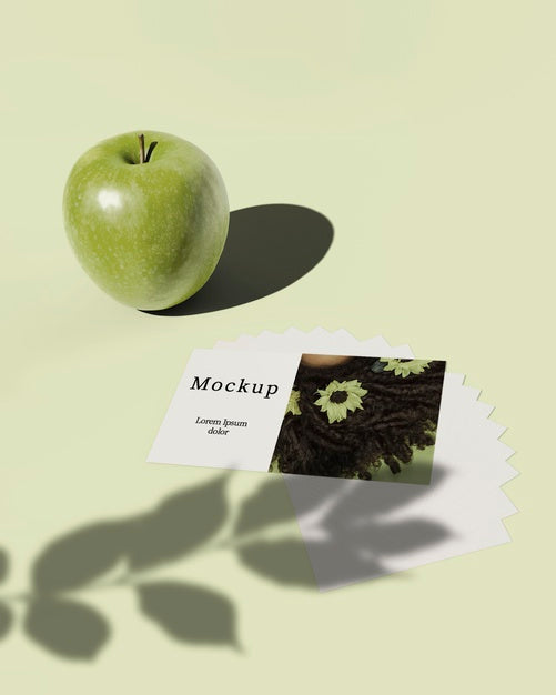 Free High Angle Of Card With Apple And Leaves Shadow Psd