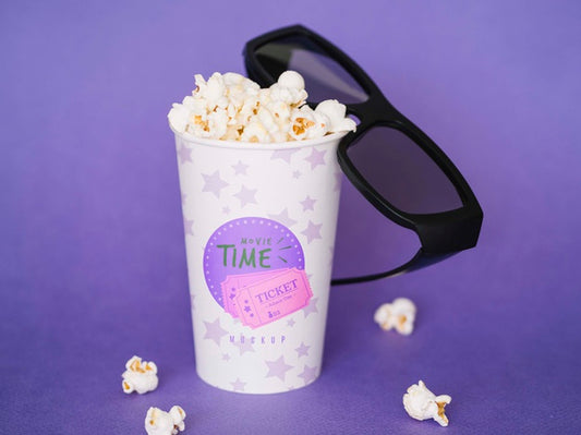 Free High Angle Of Cup With Popcorn And Cinema Glasses Psd