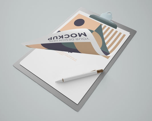 Free High Angle Of Notepad Mock-Up With Geometric Design And Pen Psd