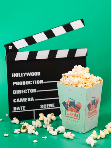Free High Angle Of Popcorn With Clapperboard Psd