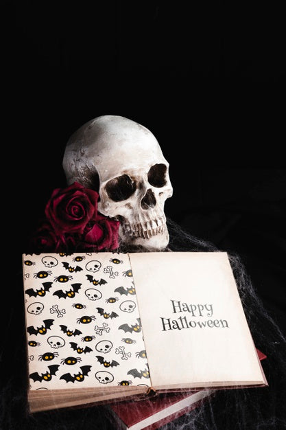 Free High Angle Of Skull And Book With Spiderweb Psd