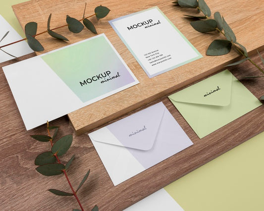 Free High Angle Stationery Mockup With Leaves Psd