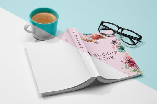 Free High Angle Turned Over Open Book Mock-Up With Glasses And Coffee Psd