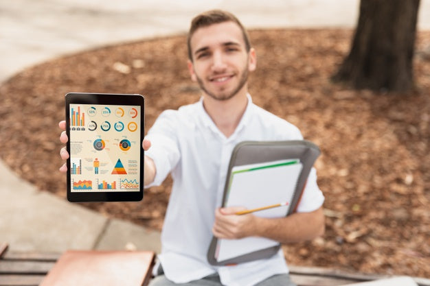 Free High Angle University Male Holding Tablet Psd