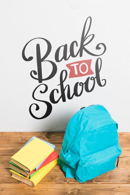 Free High View Backpack With Pile Of Books Psd