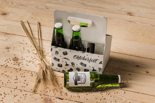 Free High View Beer Bottles With Wooden Background Psd