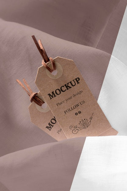 Free High View Mock-Up Of Clothing Labels On Soft Fabric Psd