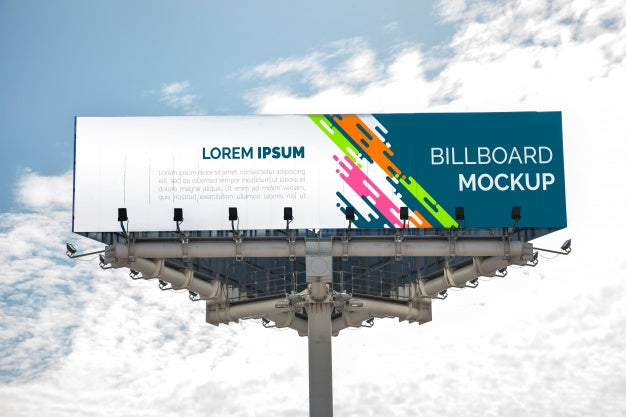 Free Huge Billboard Mockup On Cloudy Sky Psd – CreativeBooster