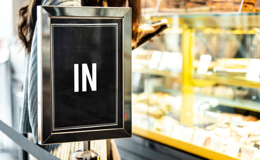 Free In Sign Mockup At The Front Of A Cafe Psd