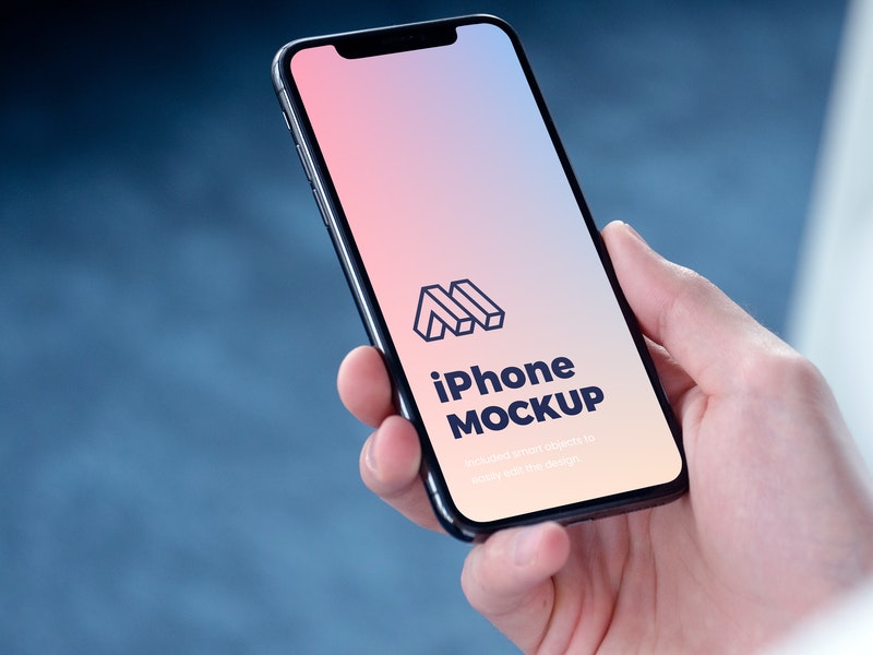 Free Iphone In Hand Psd Mockup