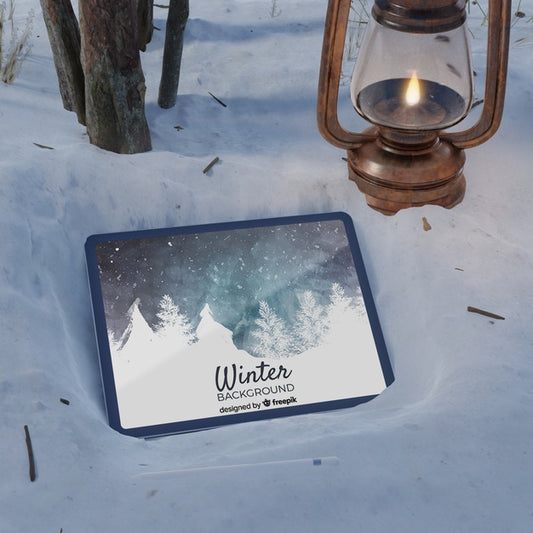 Free Lantern And Tablet On Frozen Scene Psd